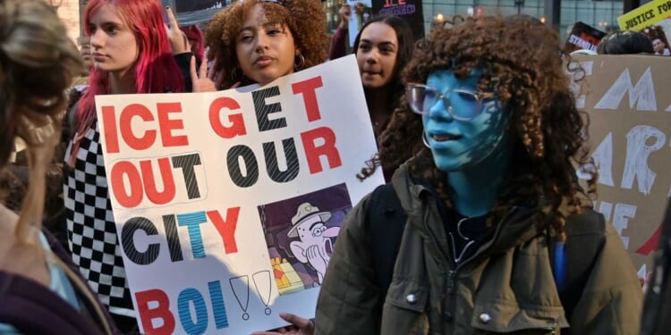 Pro-ICE student suspended over posters at California high school where hundreds of anti-ICE students walked out