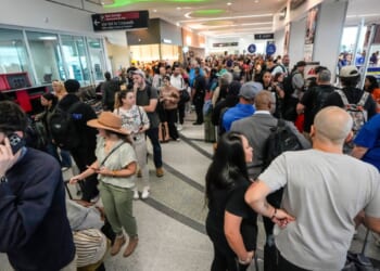 Storms and DHS shutdown snarl flights as airports see delays