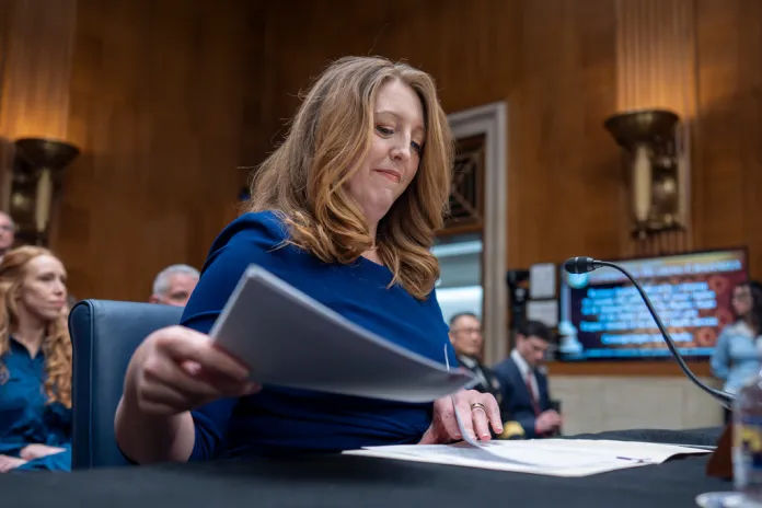 Wellness influencer and entrepreneur Dr. Casey Means takes her seat before the Senate health committee as she seeks approval to be U.S. surgeon general, at the Capitol in Washington, Wednesday, Feb. 25, 2026. (AP Photo/J. Scott Applewhite)