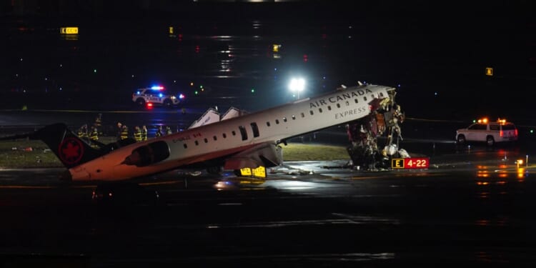 Two dead in airplane collision at LaGuardia Airport in New York City