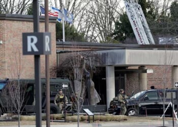 Who is the naturalized US citizen from Lebanon identified as the Michigan synagogue school attacker?