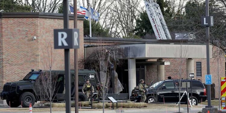 Who is the naturalized US citizen from Lebanon identified as the Michigan synagogue school attacker?