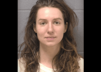 Woman accused of fatally shooting father of her 2 children amid surprise massage — and then turning gun on his parents