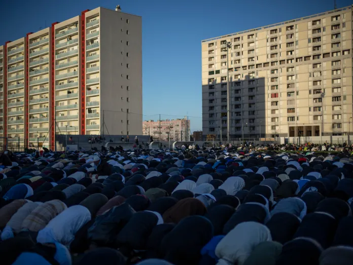 French Muslims pray at the end of Ramadan