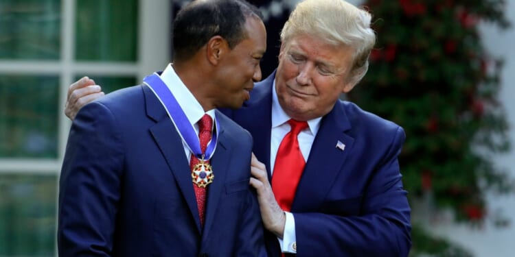 Police footage shows Tiger Woods saying he called Trump after crash